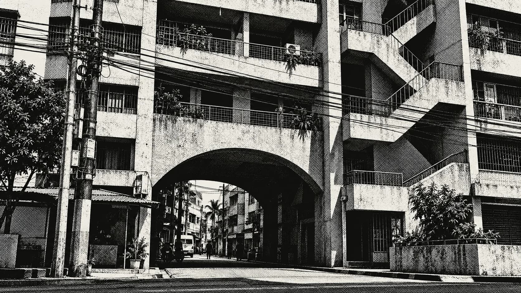 An archway connecting a Philippine city street, rendered in black and white halftone